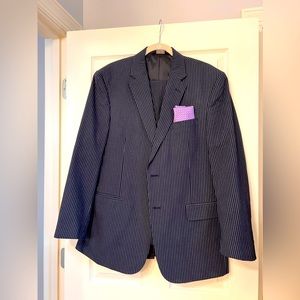 Jos A Bank tailored 2 piece suit. 100% cotton.  43R top and 37R pants.